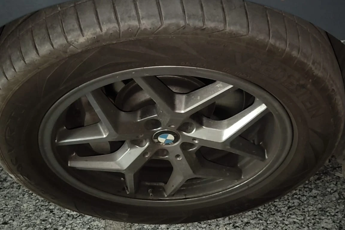 BMW alloy wheel before cleaning